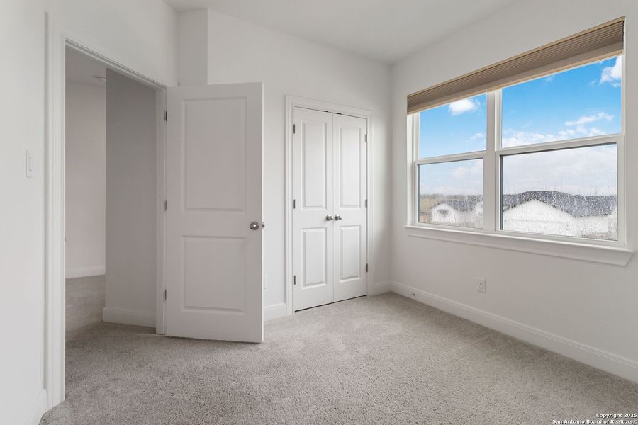 Spacious, unfurnished interior of a new home in Woodbridge Farms, La Vernia (Image 42).