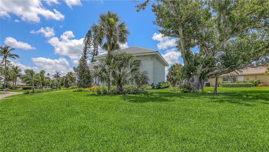 Exterior details and patio area of a home in , Longboat Key (Image 37).