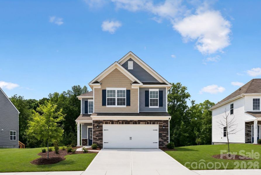 Front exterior of a new home in Shannon Woods, Maiden, NC, highlighting curb appeal (Image 2).