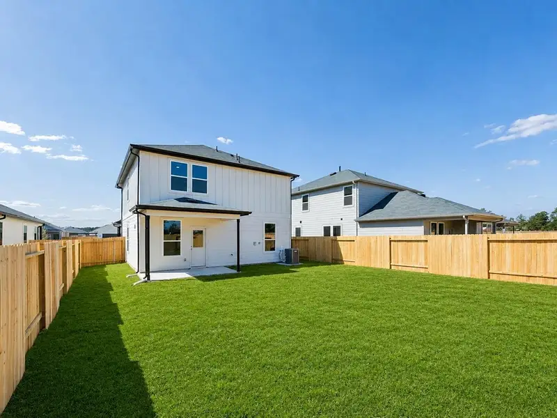 Exterior details and patio area of a home in Montgomery Bend, Montgomery (Image 3).