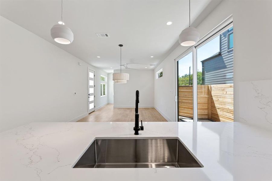 View from kitchen to dining area and living room