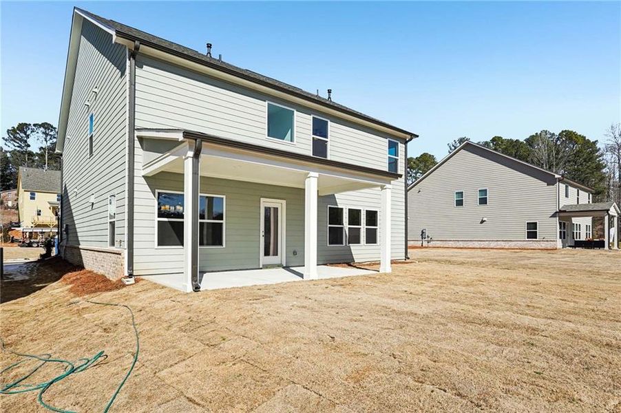Exterior details and patio area of a home in Arbors at Richland Creek, Buford (Image 27). Exterior details and patio area of a home in Arbors at Richland Creek, Buford (Image 27).