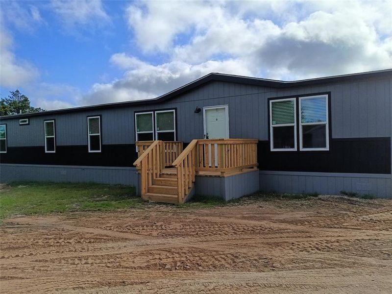 Exterior details and patio area of a home in , Springtown (Image 8).