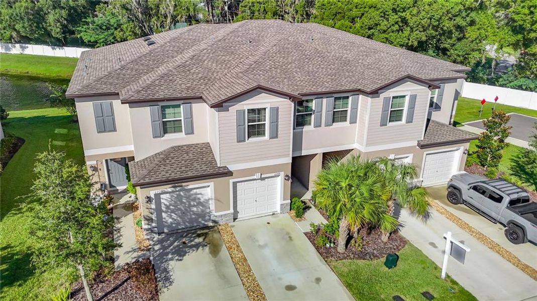 Front exterior of a new home in , Land O' Lakes, FL, highlighting curb appeal (Image 24).