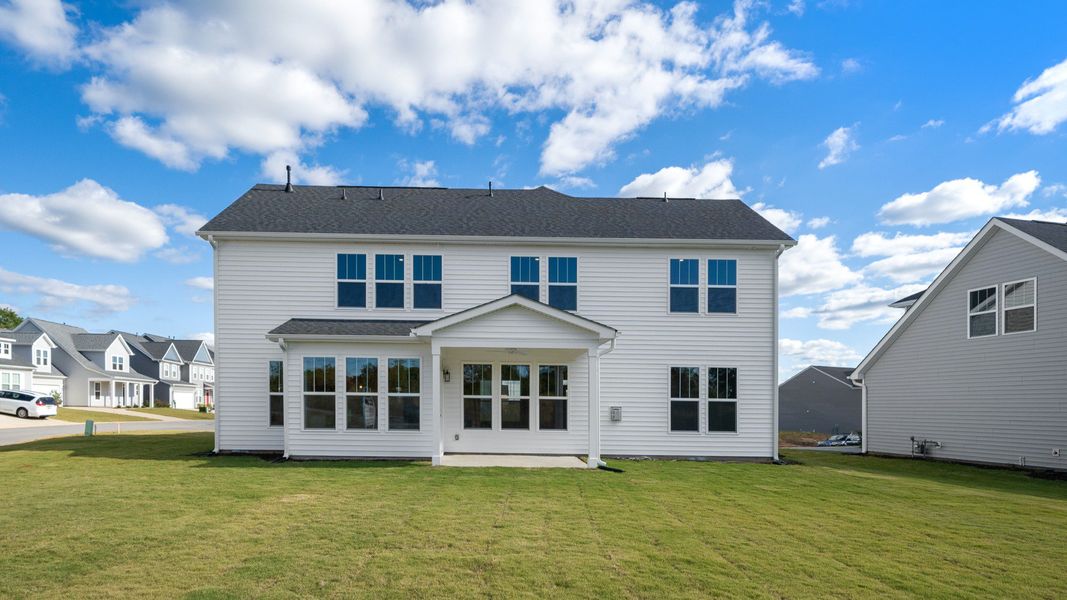 2 story single family home, all white with a 2 car garage
