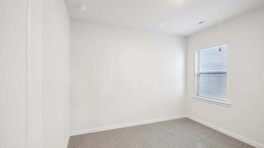 Representative unfurnished interior of a home built from the Aria by D.R. Horton in Sweetwater Village, Rockwell (Image 18).