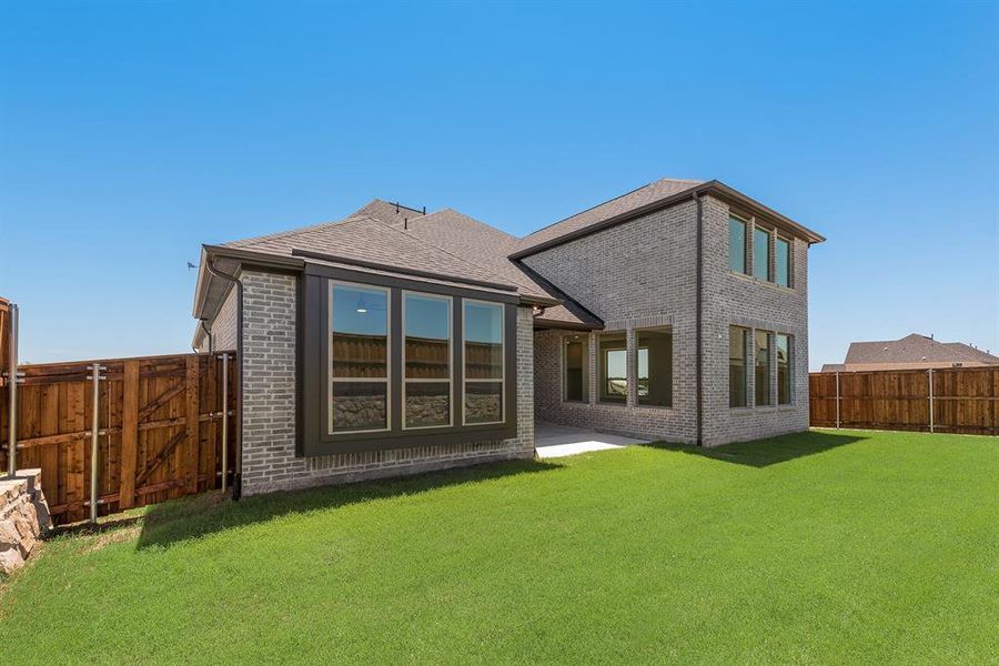 Front exterior of a new home in The Homestead - 62', Rockwall, TX, highlighting curb appeal (Image 23).