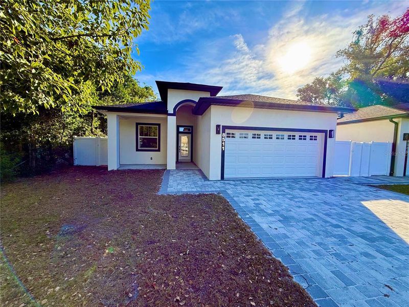 Front exterior of a new home in , Tampa, FL, highlighting curb appeal (Image 1). Front exterior of a new home in , Tampa, FL, highlighting curb appeal (Image 1).