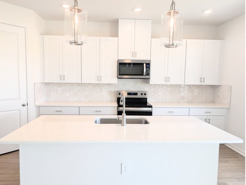 Furnished interior view inside a new home in Coasterra - Reserve Series, Palmetto (Image 6).