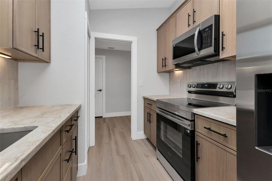 Furnished interior view inside a new home in , Punta Gorda (Image 8).