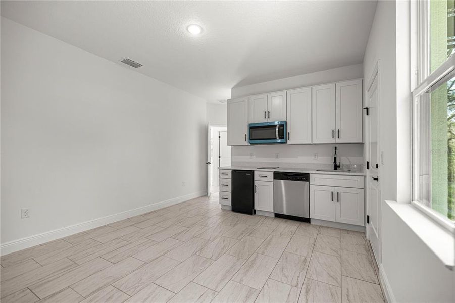 Furnished interior view inside a new home in , Citrus Springs (Image 8).