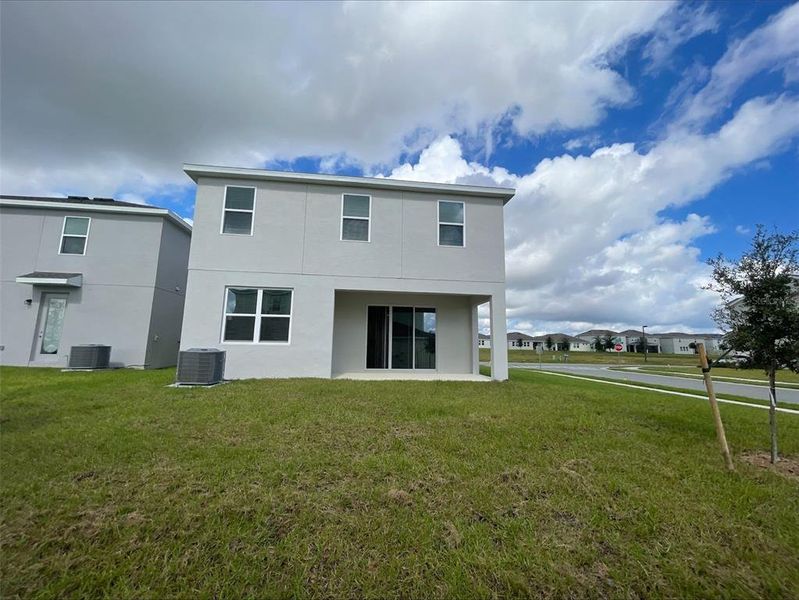 Exterior details and patio area of a home in Park View at the Hills, Minneola (Image 13).