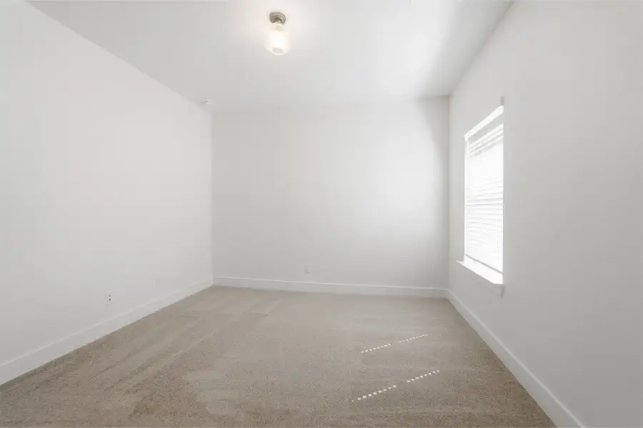 Spacious, unfurnished interior of a new home in Green Meadows, Celina (Image 61).
