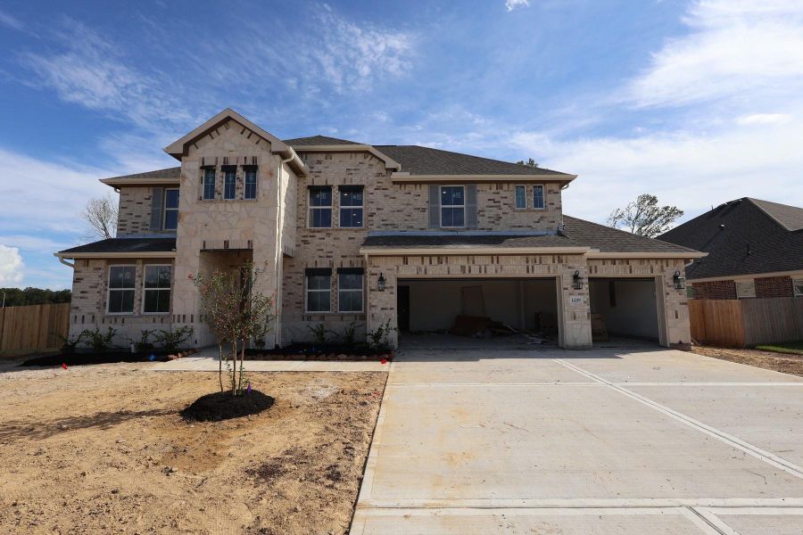 Two story home with 4 beds, 3.5 baths, and 3 car garage