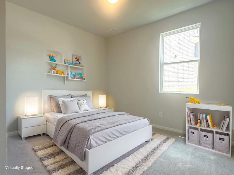 Bedroom 2-main floor-Carpeted bedroom with baseboards Bedroom 2-main floor-Carpeted bedroom with baseboards