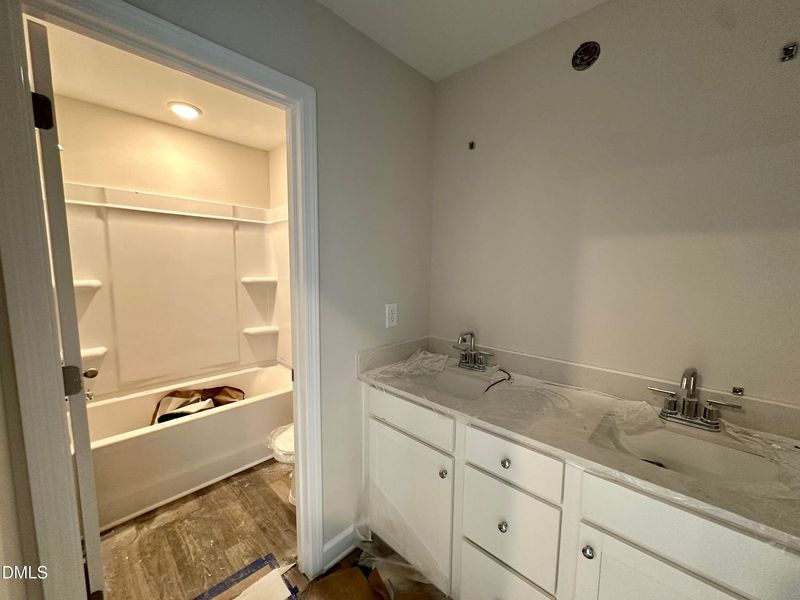 In-progress construction of a new home in Forestville Yard Townhomes, Knightdale, NC (Image 16).