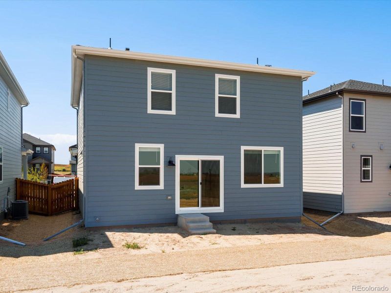 Front exterior of a new home in Lake Bluff, Greeley, CO, highlighting curb appeal (Image 15).