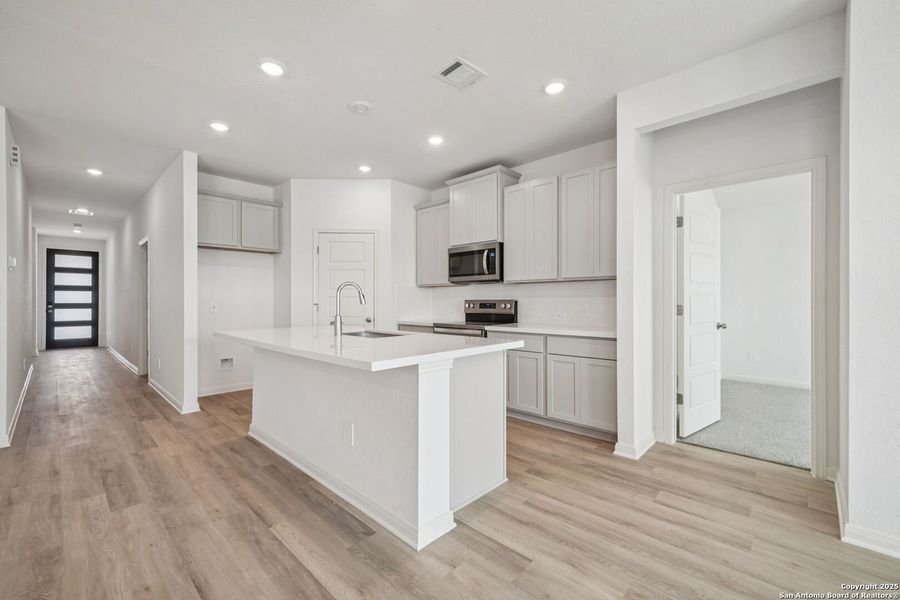 Furnished interior view inside a new home in Estancia Ranch - Premier Series, San Antonio (Image 10). Furnished interior view inside a new home in Estancia Ranch - Premier Series, San Antonio (Image 10).