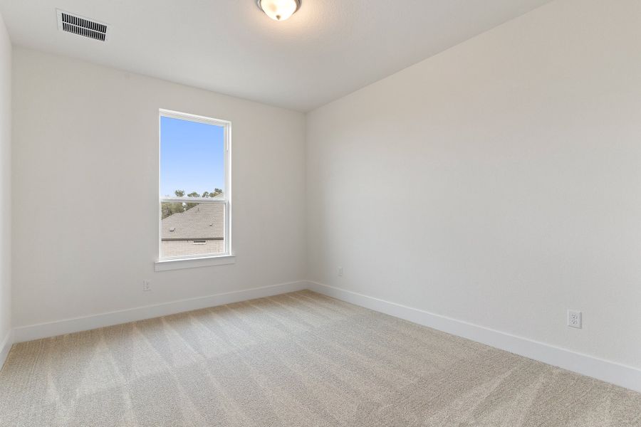 Representative unfurnished interior of a home built from the Waterville by Ashton Woods in The Trails at Carmel, Pflugerville (Image 55).