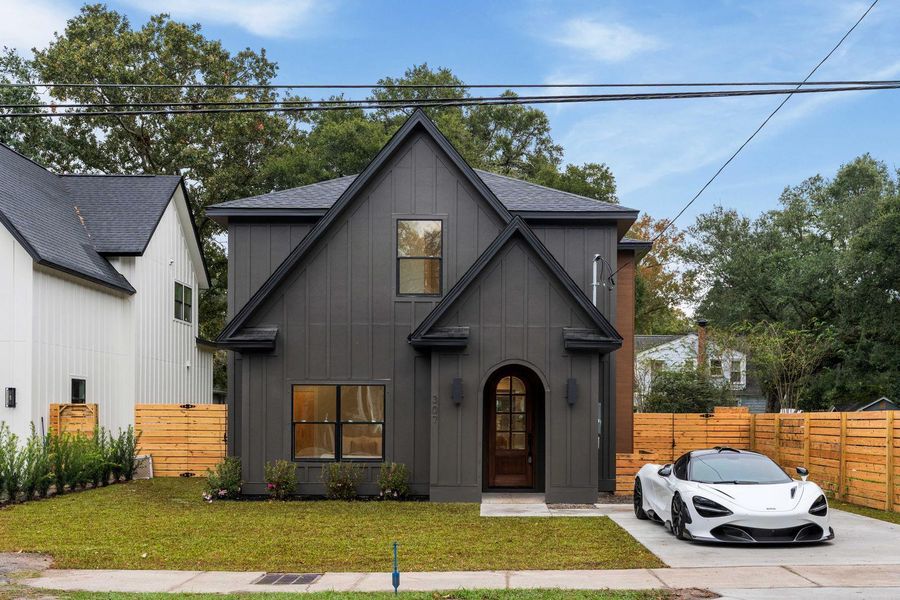 Front exterior of a new home in , Charleston, SC, highlighting curb appeal (Image 1).