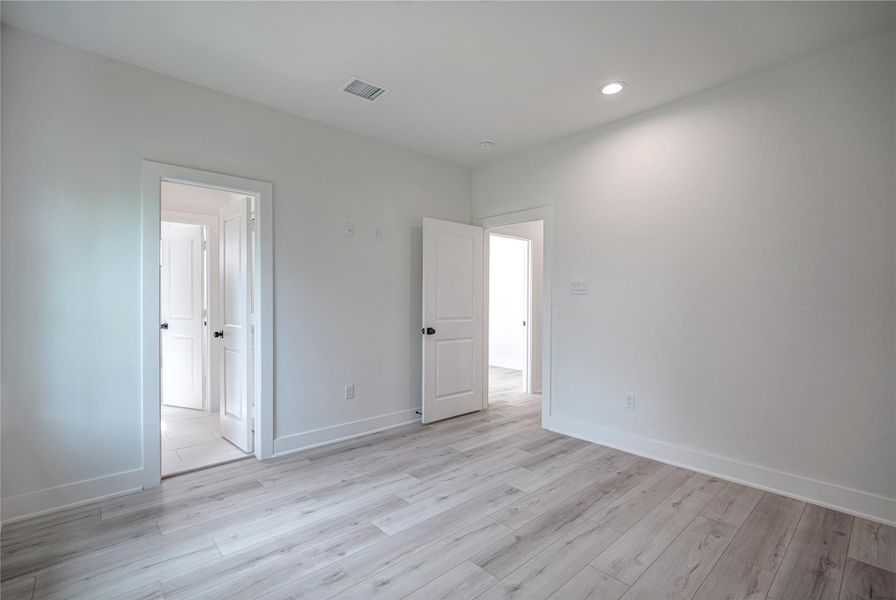 One of two secondary bedrooms