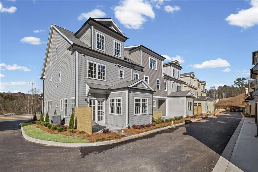 Front exterior of a new home in , Ball Ground, GA, highlighting curb appeal (Image 22).