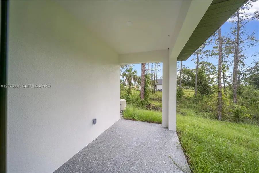 Exterior details and patio area of a home in , Lehigh Acres (Image 24).