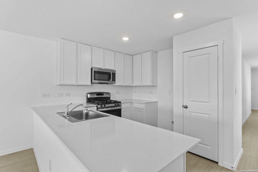 Furnished interior view inside a new home in Spring Grove, St. Hedwig (Image 9).