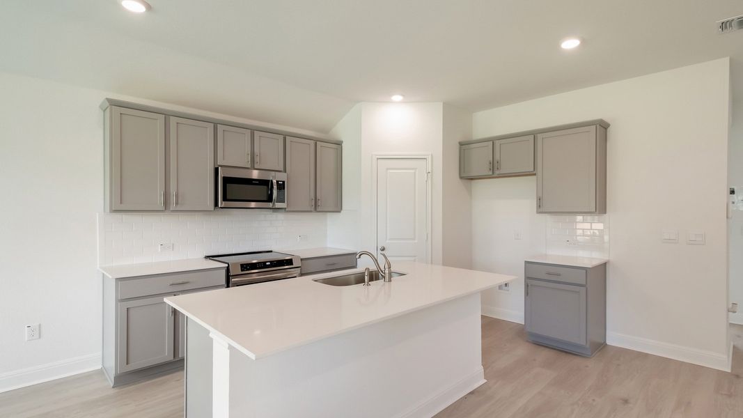 Representative furnished interior of a home built from the The Alvin by D.R. Horton in Riverview, Georgetown (Image 4).