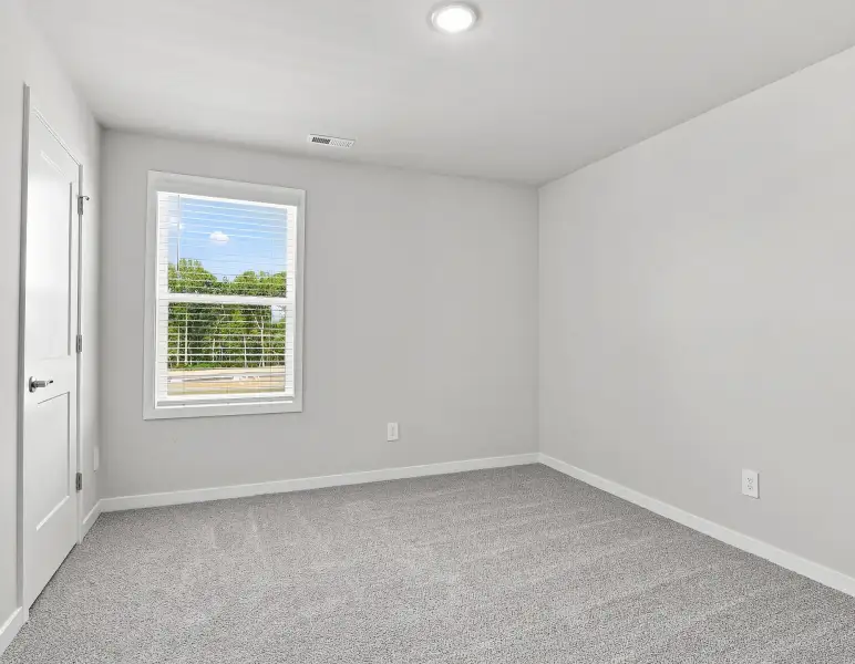 Spacious, unfurnished interior of a new home in Country Lane - Classic Series, Clayton (Image 16).