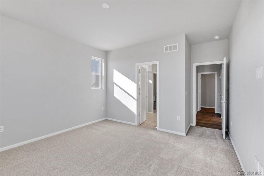 Spacious, unfurnished interior of a new home in The Legacy Collection at Talon Pointe, Thornton (Image 15).