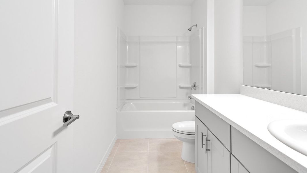 Representative furnished interior of a home built from the Ambrosia by Taylor Morrison in Aden South at Westview, Kissimmee (Image 10).