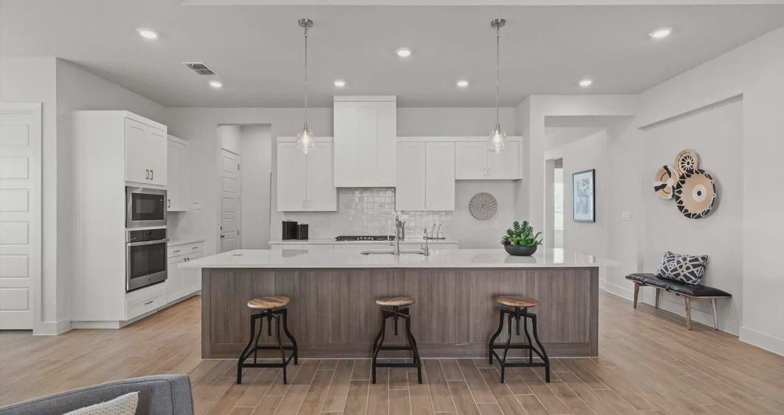 Representative furnished interior of a home built from the Wyatt by Chesmar Homes in 6 Creeks, Kyle (Image 5).
