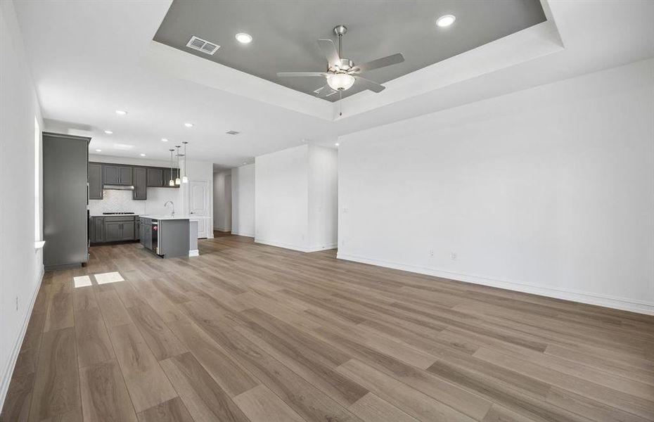 Open concept gathering area with view of kitchen Open concept gathering area with view of kitchen