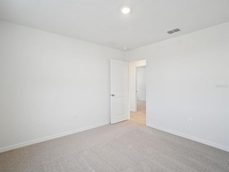 Spacious, unfurnished interior of a new home in Two Rivers - Classic Series, Zephyrhills (Image 18).