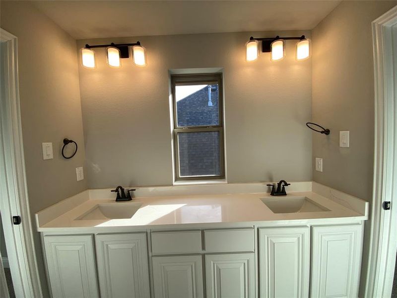 Jack & Jill bath 4 has separate dual vanity area making it easier to share (mirrors not installed yet)
