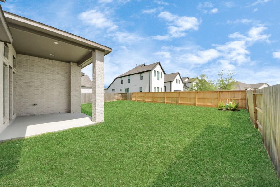 Front exterior of a new home in Marvida, Cypress, TX, highlighting curb appeal (Image 16). Front exterior of a new home in Marvida, Cypress, TX, highlighting curb appeal (Image 16).