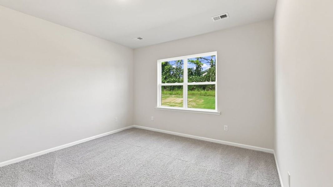 Spacious, unfurnished interior of a new home in Durbin Meadows Traditions, Fountain Inn (Image 25).