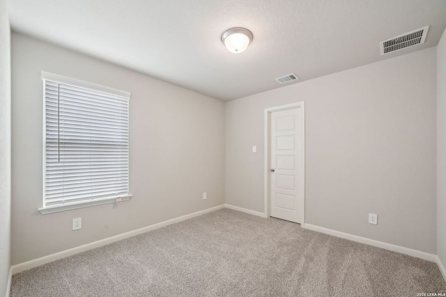 Spacious, unfurnished interior of a new home in Legendary Trails - Premier Series, Cibolo (Image 18).