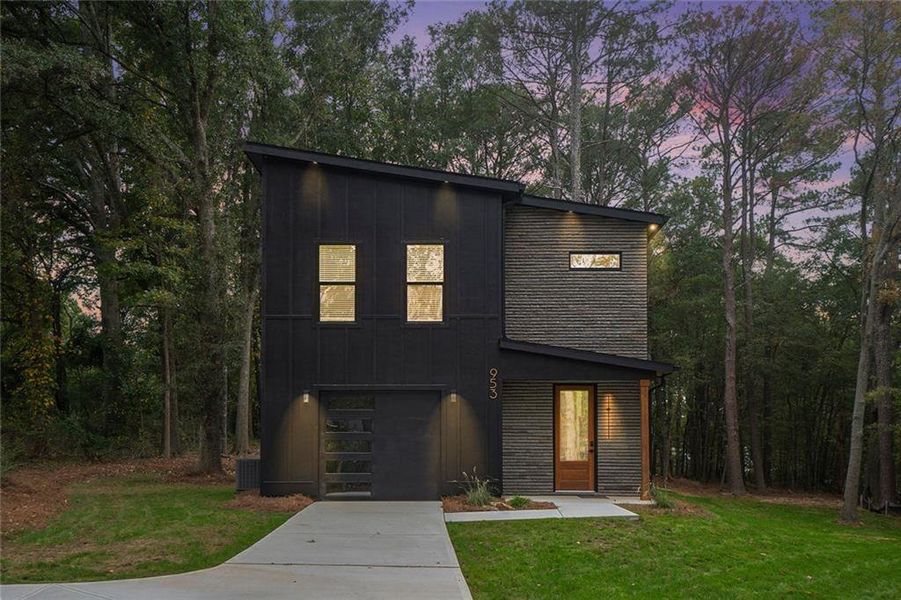 Front exterior of a new home in , Conyers, GA, highlighting curb appeal (Image 14). Front exterior of a new home in , Conyers, GA, highlighting curb appeal (Image 14).