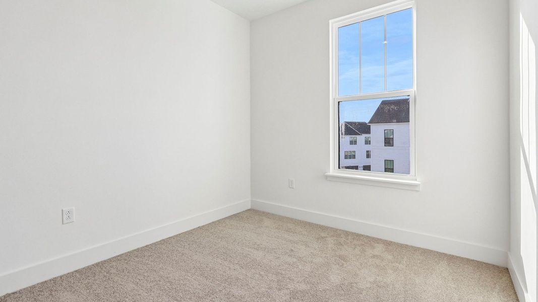 Furnished interior view inside a new home in Parkview at Hamlin, Winter Garden (Image 33).
