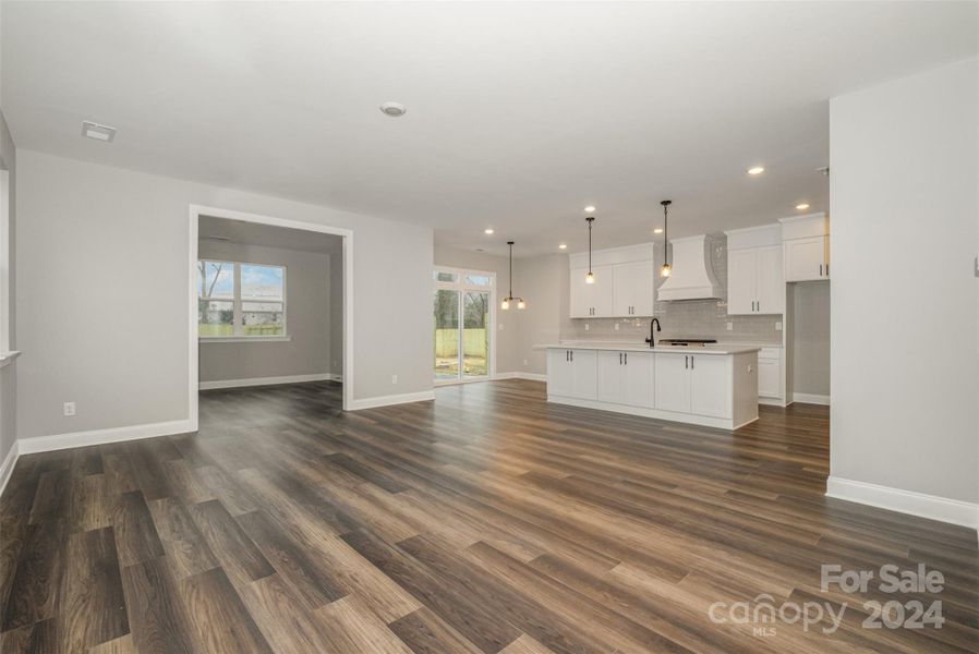 Now this is "Open Concept." Note the beautiful Luxury Vinyl Plank floors. (Representative Photo)