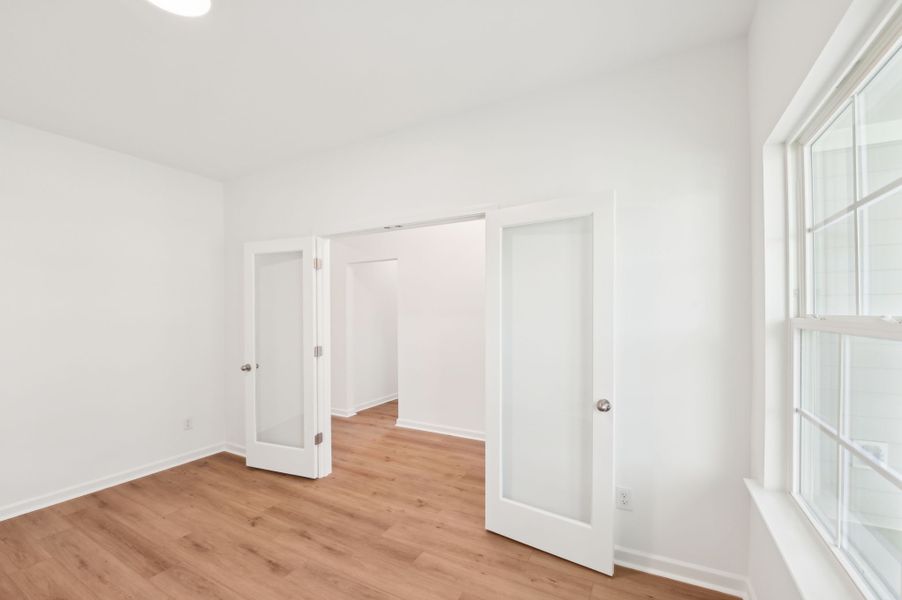 Representative unfurnished interior of a home built from the Alexis by Ashton Woods in Rowland's Grant, Fuquay Varina (Image 29).