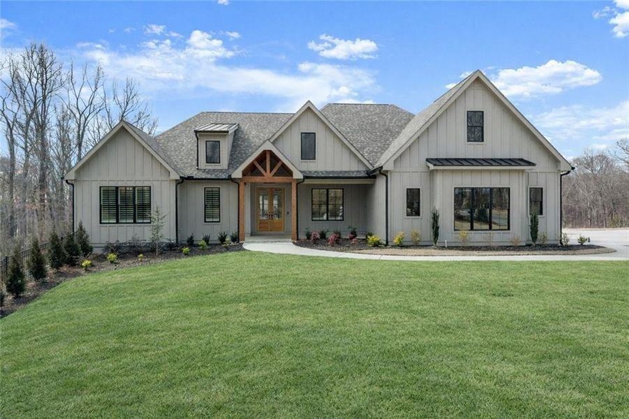 Front exterior of a new home in , Gainesville, GA, highlighting curb appeal (Image 2). Front exterior of a new home in , Gainesville, GA, highlighting curb appeal (Image 2).