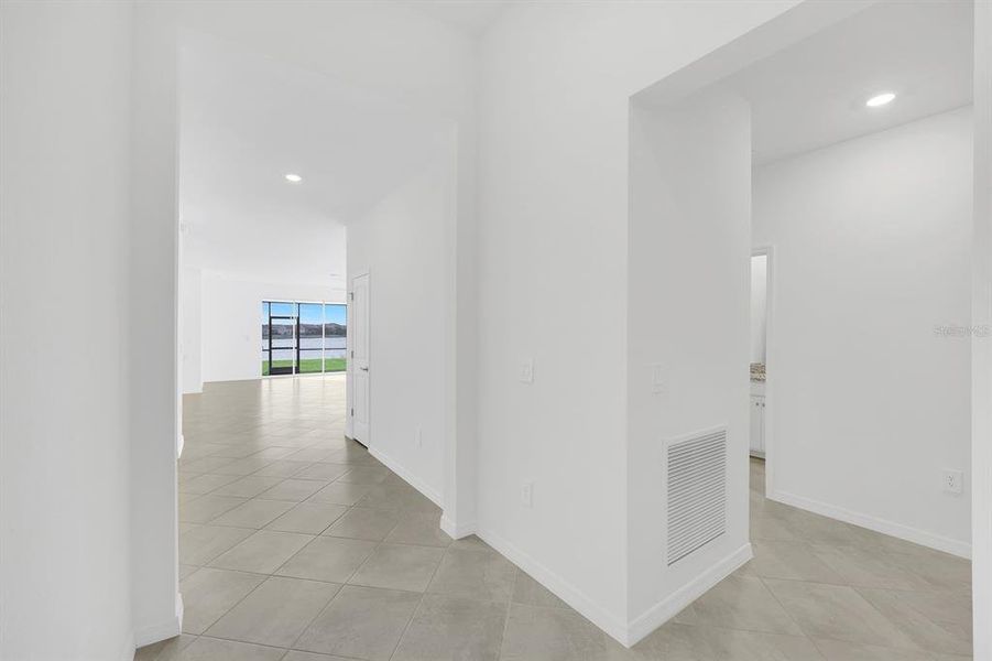 Spacious, unfurnished interior of a new home in Hampton Lakes at River Hall, Alva (Image 22).