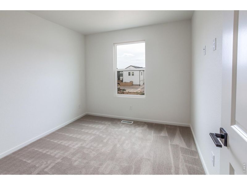 Spacious, unfurnished interior of a new home in Bloom Cottages, Fort Collins (Image 27).