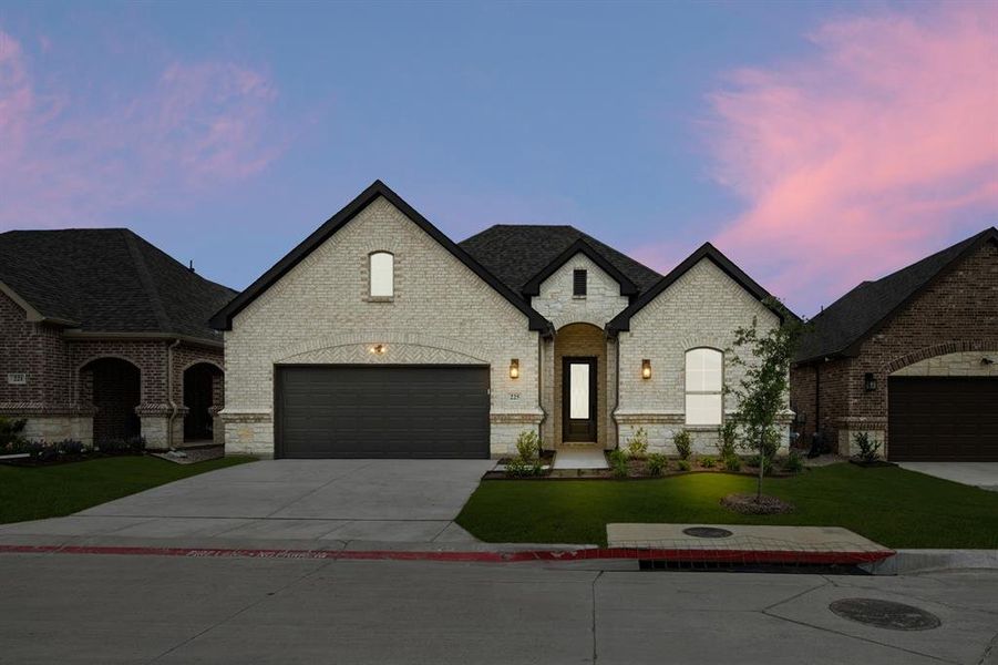 Front exterior of a new home in Ladera at Timberbrook, Justin, TX, highlighting curb appeal (Image 2). Front exterior of a new home in Ladera at Timberbrook, Justin, TX, highlighting curb appeal (Image 2).