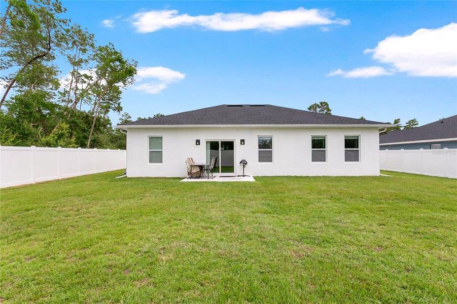 Exterior details and patio area of a home in , Ocala (Image 3).