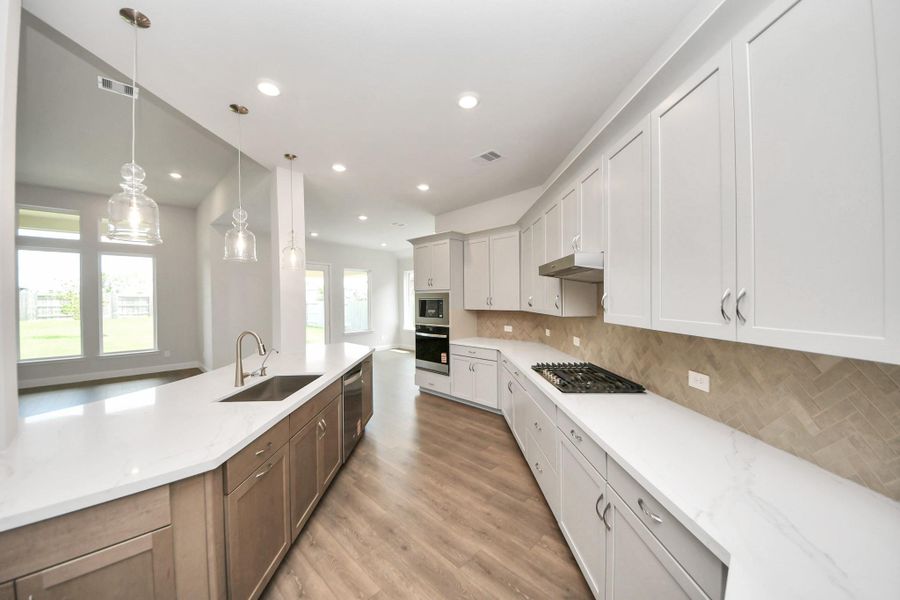 Furnished interior view inside a new home in ARTAVIA: Hilltop Collection, Conroe (Image 14). Furnished interior view inside a new home in ARTAVIA: Hilltop Collection, Conroe (Image 14).