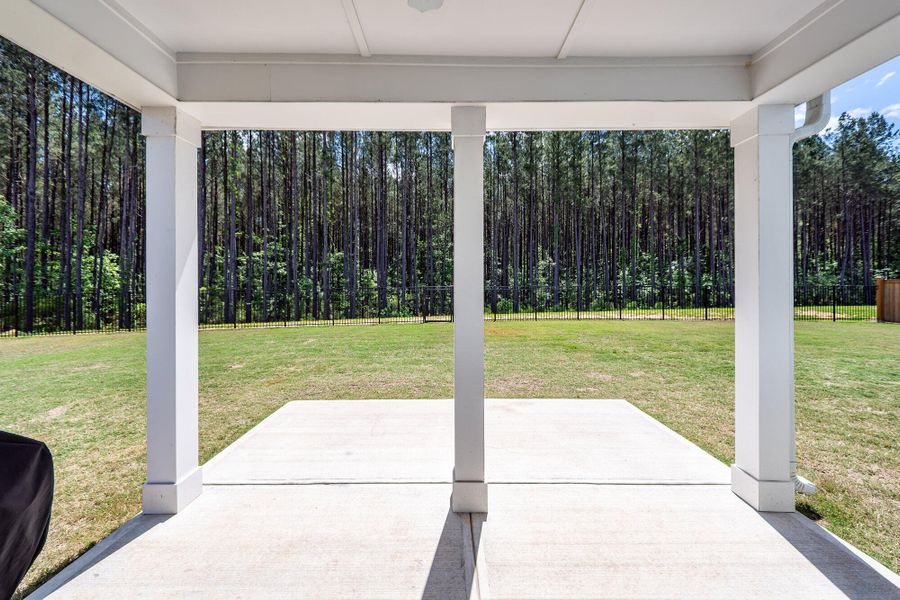 Exterior details and patio area of a home in , Ravenel (Image 30). Exterior details and patio area of a home in , Ravenel (Image 30).